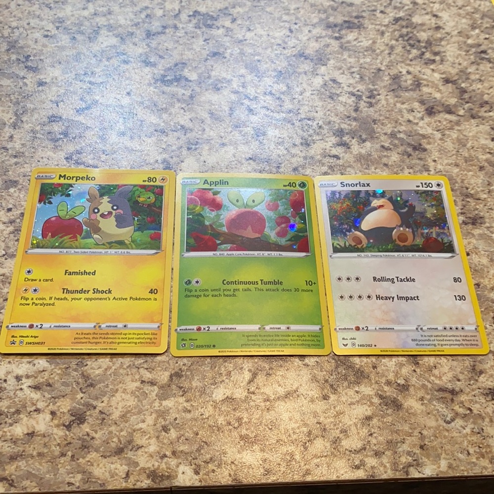 Three Pokémon Cards